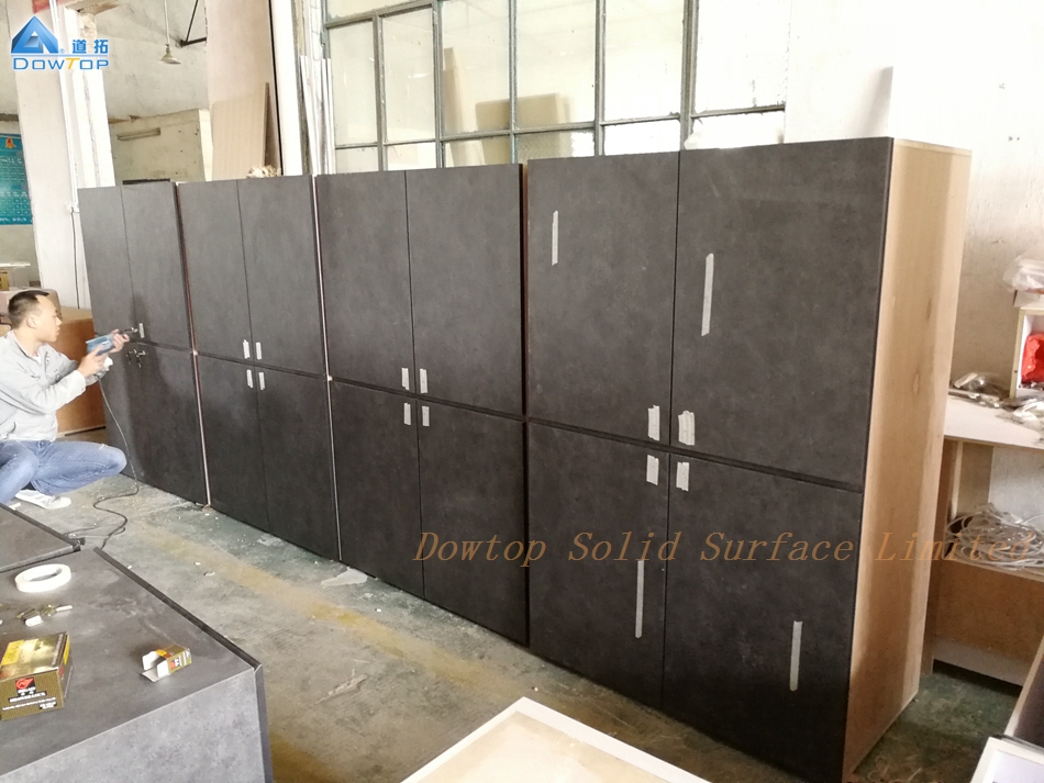 Modern black corian surface and wood office cabinet